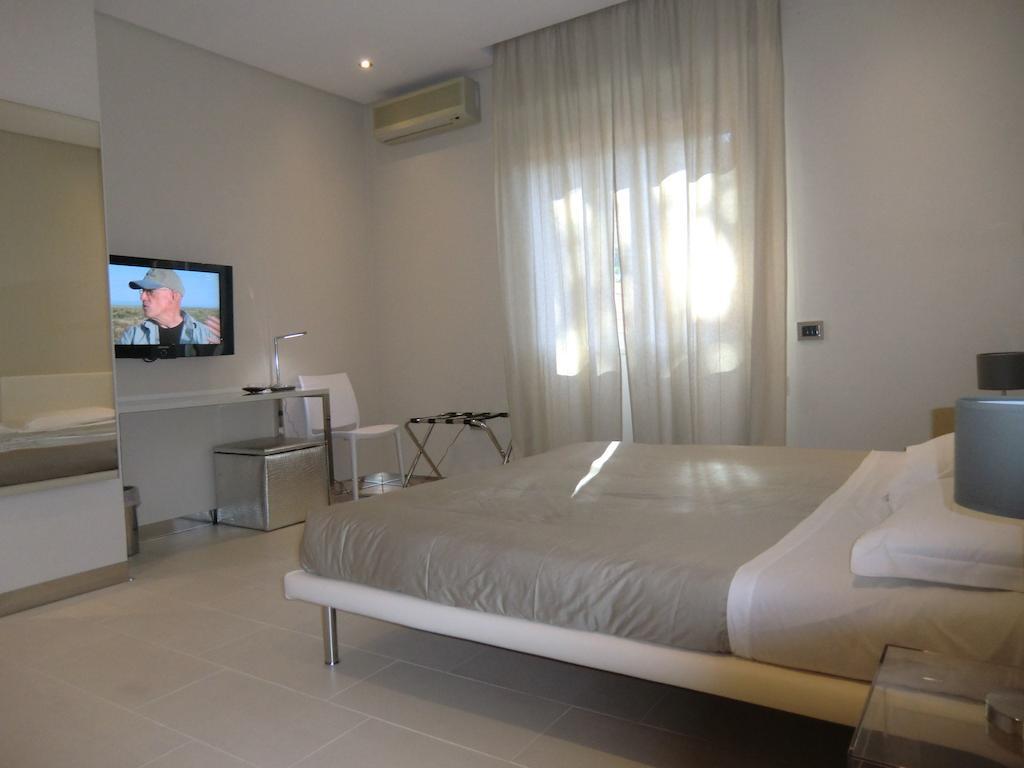 B&Beach Cagliari Guest House Habitación foto